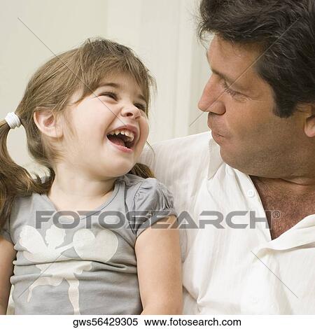 Close-up of a male teacher and his student View Large Photo Image Stock Photography - Close-up of a male teacher and his student. Fotosearch