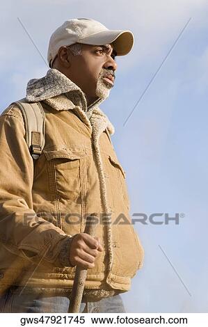 Close-up of a mature man hiking View Large Photo Image Stock Photography - Close-up of a mature man hiking. Fotosearch