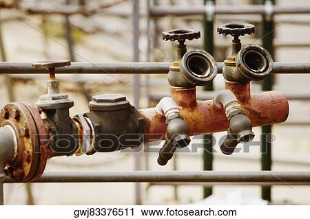 Stock Image - Close-up of a pipeline, Genoa, Liguria, Italy. Fotosearch