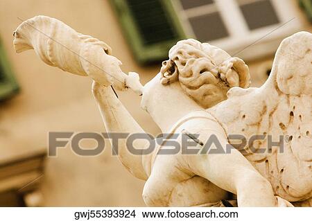 Close-up of a statue, Piazza Colombo, Genoa, Liguria, Italy View Large Photo Image Picture - Close-up of a statue, Piazza Colombo, Genoa, Liguria, Italy. Fotosearch