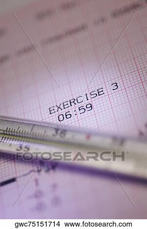 Close-up of a syringe on a medical report View Large Photo Image Picture - Close-up of a syringe on a medical report. Fotosearch