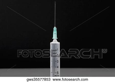 Close-up of a syringe View Large Photo Image Stock Image - Close-up of a syringe. Fotosearch