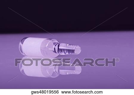 Close-up of a vial View Large Photo Image Stock Photograph - Close-up of a vial. Fotosearch