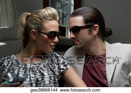 Picture - Close-up of a young couple romancing. Fotosearch