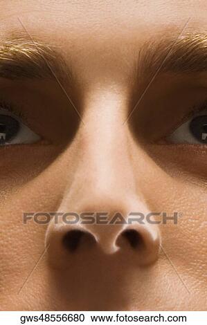 Stock Image - Close-up of a young man's nose. Fotosearch
