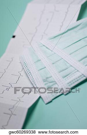 Close-up of an electrocardiogram report with a bandage View Large Photo Image Stock Photo - Close-up of an electrocardiogram report with a bandage. Fotosearch