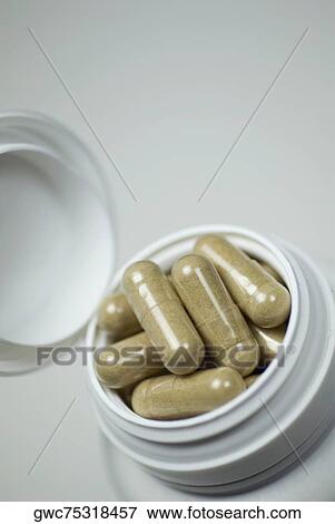 Close-up of capsules in a pill bottle View Large Photo Image Stock Photo - Close-up of capsules in a pill bottle. Fotosearch