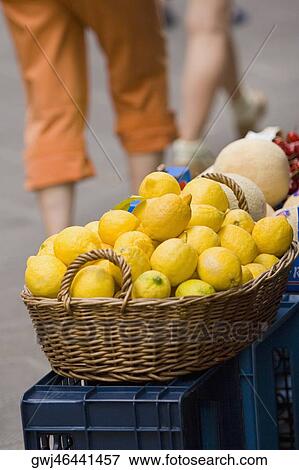 Close-up of lemons in a wicker basket at a market stall, Italian Riviera, Cinque Terre National Park, Vernazza, La Spezia, Liguria, Italy View Large Photo Image Stock Photo - Close-up of lemons in a wicker basket at a market stall, Italian Riviera, Cinque Terre National Park, Vernazza, La Spezia, Liguria, Italy. Fotosearch