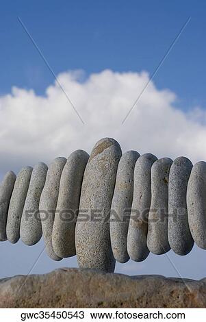 Close-up of pebbles arranged on rock View Large Photo Image Stock Image - Close-up of pebbles arranged on rock. Fotosearch