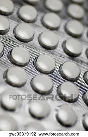 Close-up of pills in blister packs View Large Photo Image Stock Image - Close-up of pills in blister packs. Fotosearch