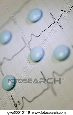Close-up of pills on a medical record View Large Photo Image Stock Photo - Close-up of pills on a medical record. Fotosearch