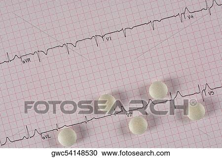 Close-up of pills on a medical report View Large Photo Image Stock Image - Close-up of pills on a medical report. Fotosearch