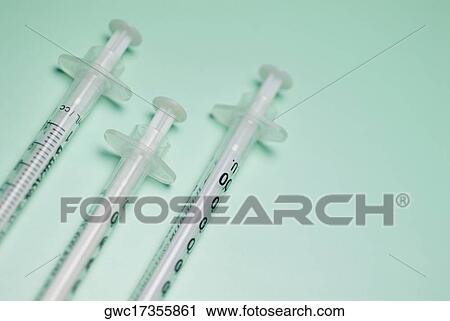 Close-up of three syringes View Large Photo Image Stock Image - Close-up of three syringes. Fotosearch