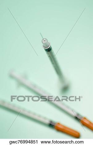 Close-up of three syringes View Large Photo Image Stock Image - Close-up of three syringes. Fotosearch