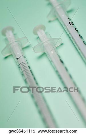 Close-up of three syringes View Large Photo Image Stock Photography - Close-up of three syringes. Fotosearch
