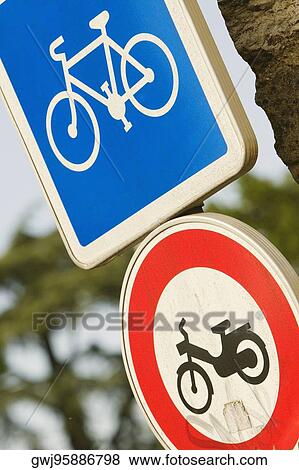 Close-up of two bicycle lane signboards, Le Mans, Sarthe, Pays-de-la-Loire, France View Large Photo Image Stock Photo - Close-up of two bicycle lane signboards, Le Mans, Sarthe, Pays-de-la-Loire, France. Fotosearch