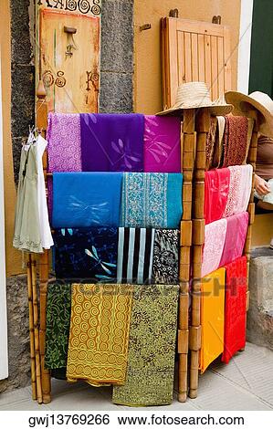Stock Photograph - Clothes at a market stall, Cinque Terre National Park, Vernazza, La Spezia, Liguria, Italy. Fotosearch