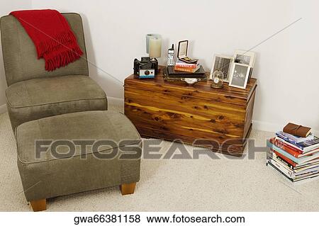 Couch near a cabinet in a living room View Large Photo Image Stock Photo - Couch near a cabinet in a living room. Fotosearch