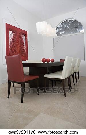 Decorative urns on a dining table in a dining room View Large Photo Image Stock Image - Decorative urns on a dining table in a dining room. Fotosearch