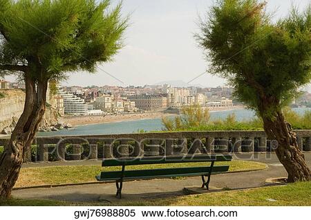 Empty bench in a garden, St. Martin, Grande Plage, Biarritz, France View Large Photo Image Stock Photography - Empty bench in a garden, St. Martin, Grande Plage, Biarritz, France. Fotosearch