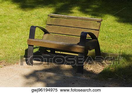 Empty bench in a park, Le Mans, Sarthe, Pays-de-la-Loire, France View Large Photo Image Stock Photography - Empty bench in a park, Le Mans, Sarthe, Pays-de-la-Loire, France. Fotosearch