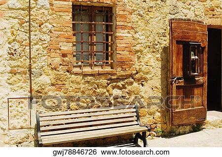 Empty bench in front of a wall, Monteriggioni, Siena Province, Tuscany, Italy View Large Photo Image Stock Photograph - Empty bench in front of a wall, Monteriggioni, Siena Province, Tuscany, Italy. Fotosearch