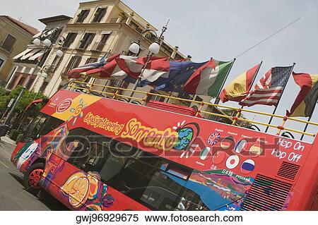 Stock Photography - European union flags fluttering on a bus, Piazza Tasso, Sorrento, Naples Province, Campania, Italy. Fotosearch