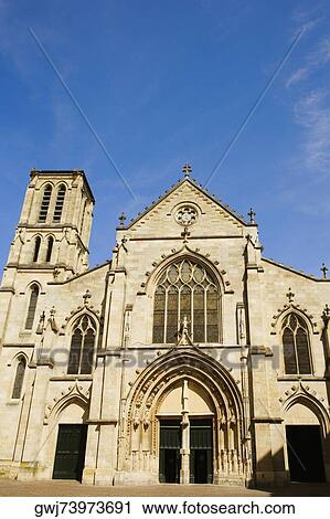 Stock Image - Facade of a church, St. Pierre Church, Bordeaux, Aquitaine, France. Fotosearch
