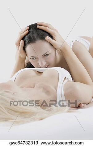 Female homosexual couple doing sexual activity View Large Photo Image Stock Photo - Female homosexual couple doing sexual activity. Fotosearch