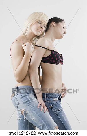 Female homosexual couple embracing each other View Large Photo Image Stock Image - Female homosexual couple embracing each other. Fotosearch