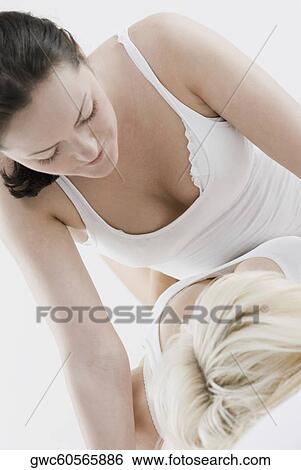 Female homosexual couple romancing View Large Photo Image Stock Photograph - Female homosexual couple romancing. Fotosearch