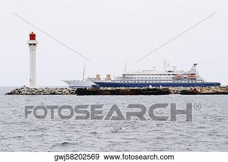 Ferry in the sea, Baie De Cannes, Cote d'Azur, Cannes, Provence-Alpes-Cote D'Azur, France View Large Photo Image Stock Photo - Ferry in the sea, Baie De Cannes, Cote d'Azur, Cannes, Provence-Alpes-Cote D'Azur, France. Fotosearch