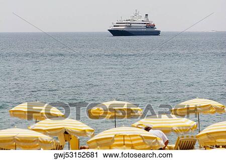 Ferry in the sea, Plage De La Croisette, Cote d'Azur, Cannes, Provence-Alpes-Cote D'Azur, France View Large Photo Image Stock Image - Ferry in the sea, Plage De La Croisette, Cote d'Azur, Cannes, Provence-Alpes-Cote D'Azur, France. Fotosearch