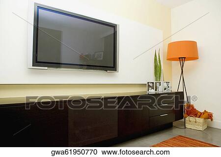 Stock Image - Flat panel television in a living room. Fotosearch