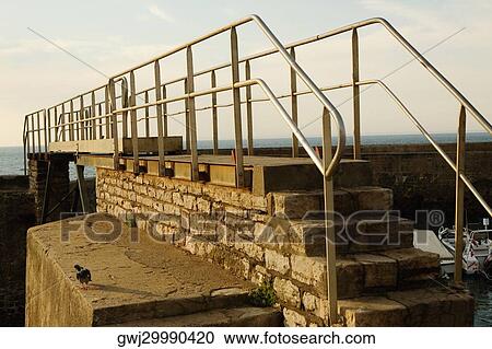 Footbridge at the seaside, Port Des Pecheurs, Biarritz, France View Large Photo Image Stock Image - Footbridge at the seaside, Port Des Pecheurs, Biarritz, France. Fotosearch
