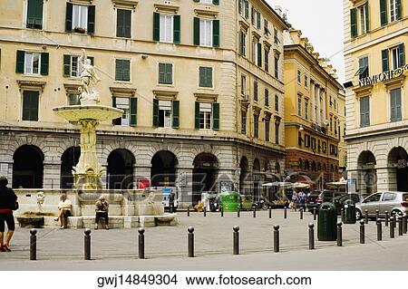 Picture - Fountain in front of buildings, Piazza Colombo, Genoa, Liguria, Italy. Fotosearch