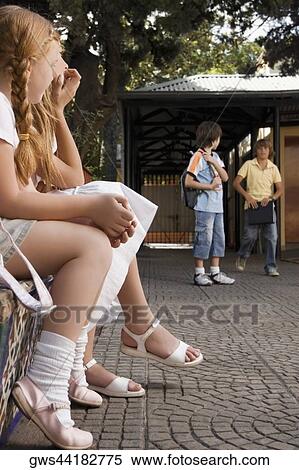 Four school students outside a school View Large Photo Image Stock Photography - Four school students outside a school. Fotosearch