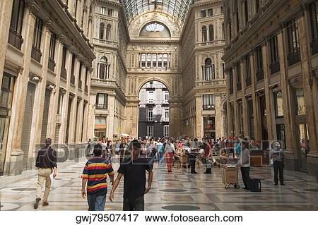 Group of people in a shopping mall, Galleria Umberto I, Naples, Naples Province, Campania, Italy View Large Photo Image Stock Photo - Group of people in a shopping mall, Galleria Umberto I, Naples, Naples Province, Campania, Italy. Fotosearch