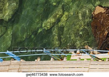 High angle view of a boardwalk, Bay of Naples, Sorrento, Sorrentine Peninsula, Naples Province, Campania, Italy View Large Photo Image Stock Photo - High angle view of a boardwalk, Bay of Naples, Sorrento, Sorrentine Peninsula, Naples Province, Campania, Italy. Fotosearch