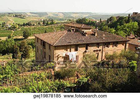 High angle view of a building, San Gimignano, Siena Province, Tuscany, Italy View Large Photo Image Stock Photography - High angle view of a building, San Gimignano, Siena Province, Tuscany, Italy. Fotosearch