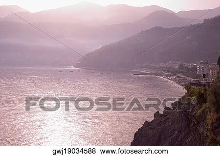 High angle view of a coastline, Amalfi Coast, Maiori, Salerno, Campania, Italy View Large Photo Image Stock Photo - High angle view of a coastline, Amalfi Coast, Maiori, Salerno, Campania, Italy. Fotosearch