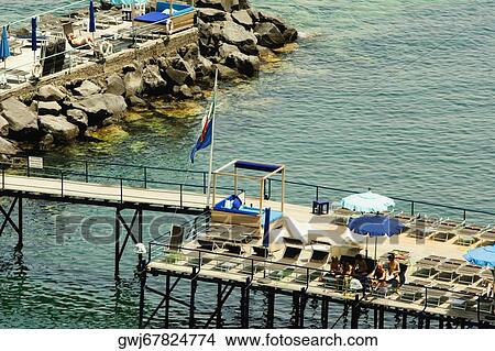 High angle view of a group of people at a pier, Marina Grande, Capri, Sorrento, Naples Province, Campania, Italy View Large Photo Image Picture - High angle view of a group of people at a pier, Marina Grande, Capri, Sorrento, Naples Province, Campania, Italy. Fotosearch