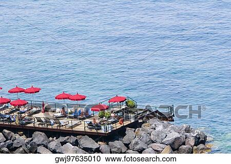 High angle view of a group of people on a platform, Marina Grande, Capri, Sorrento, Naples Province, Campania, Italy View Large Photo Image Stock Image - High angle view of a group of people on a platform, Marina Grande, Capri, Sorrento, Naples Province, Campania, Italy. Fotosearch