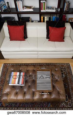 High angle view of a serving tray and towels on a table in a living room View Large Photo Image Stock Photo - High angle view of a serving tray and towels on a table in a living room. Fotosearch