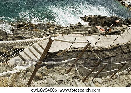 Stock Photography - High angle view of a staircase at the seaside, RioMaggiore, Cinque Terre, Italian Riviera, Cinque Terre National Park, Vernazza, La Spezia, Liguria, Italy. Fotosearch