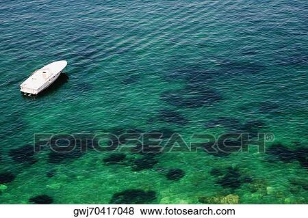 High angle view of a tourboat in the sea, Bay of Naples, Sorrento, Sorrentine Peninsula, Naples Province, Campania, Italy View Large Photo Image Stock Photo - High angle view of a tourboat in the sea, Bay of Naples, Sorrento, Sorrentine Peninsula, Naples Province, Campania, Italy. Fotosearch