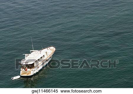 High angle view of a tourboat in the sea, Bay of Naples, Sorrento, Sorrentine Peninsula, Naples Province, Campania, Italy View Large Photo Image Stock Photography - High angle view of a tourboat in the sea, Bay of Naples, Sorrento, Sorrentine Peninsula, Naples Province, Campania, Italy. Fotosearch