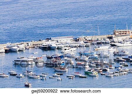 High angle view of boats at a harbor, Italian Riviera, Santa Margherita Ligure, Genoa, Liguria, Italy View Large Photo Image Stock Image - High angle view of boats at a harbor, Italian Riviera, Santa Margherita Ligure, Genoa, Liguria, Italy. Fotosearch