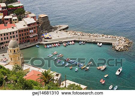 High angle view of boats in the sea, Church of Santa Margherita d'Antiochia, Doria Castle, Italian Riviera, Cinque Terre National Park, Vernazza, La Spezia, Liguria, Italy View Large Photo Image Stock Image - High angle view of boats in the sea, Church of Santa Margherita d'Antiochia, Doria Castle, Italian Riviera, Cinque Terre National Park, Vernazza, La Spezia, Liguria, Italy. Fotosearch