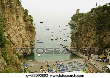 High angle view of boats in the sea, Torre Normanna, Praiano, Amalfi Coast, Salerno, Campania, Italy View Large Photo Image Stock Image - High angle view of boats in the sea, Torre Normanna, Praiano, Amalfi Coast, Salerno, Campania, Italy. Fotosearch